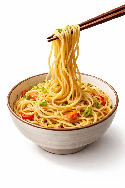 Chopsticks Lifting Fresh Noodles From A Ceramic Bowl