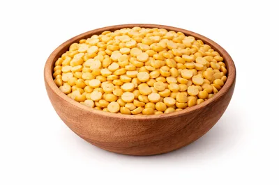 Wooden Bowl Filled With Split Yellow Peas