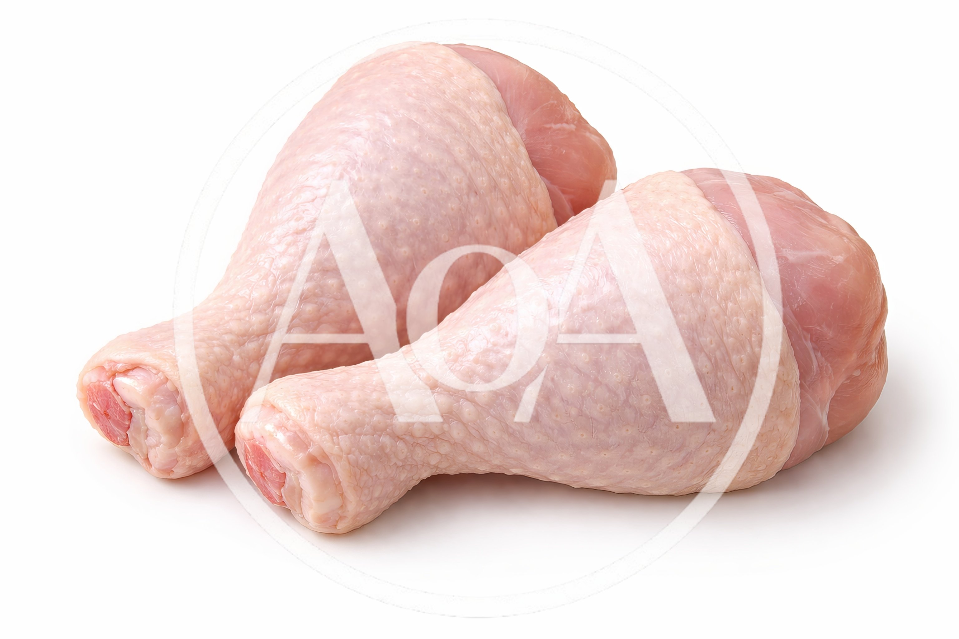 Two Raw Chicken Drumsticks on White Background