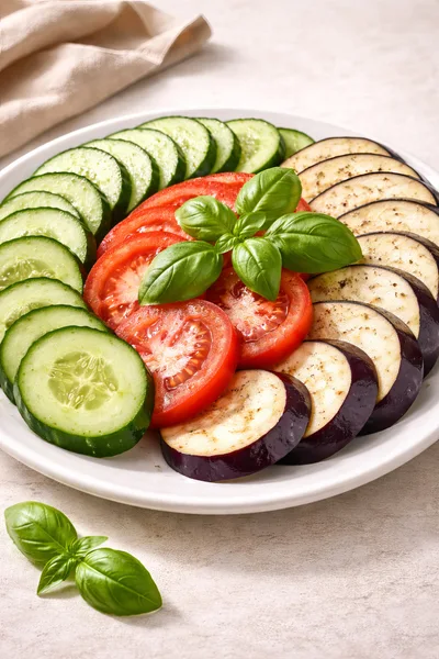 Fresh Vegetable Platter With Sliced Cucumber Tomato And Eggplant