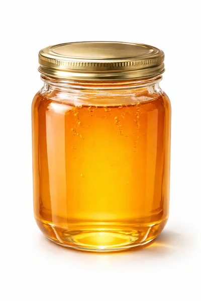 Glass Jar Filled With Golden Honey