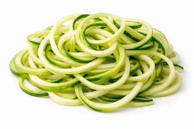 Fresh Spiralized Zucchini Noodles Isolated On White