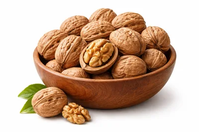 Walnuts in a Wooden Bowl on White Background