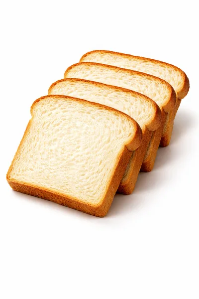Four Slices Of White Bread Arranged In A Row
