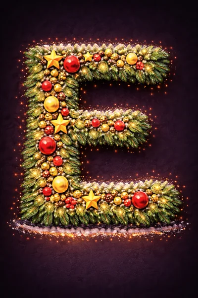 Christmas Letter E Decorated With Ornaments And Pine