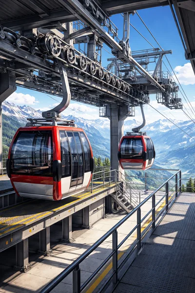 Cable Car Station With Gondolas In The Alps