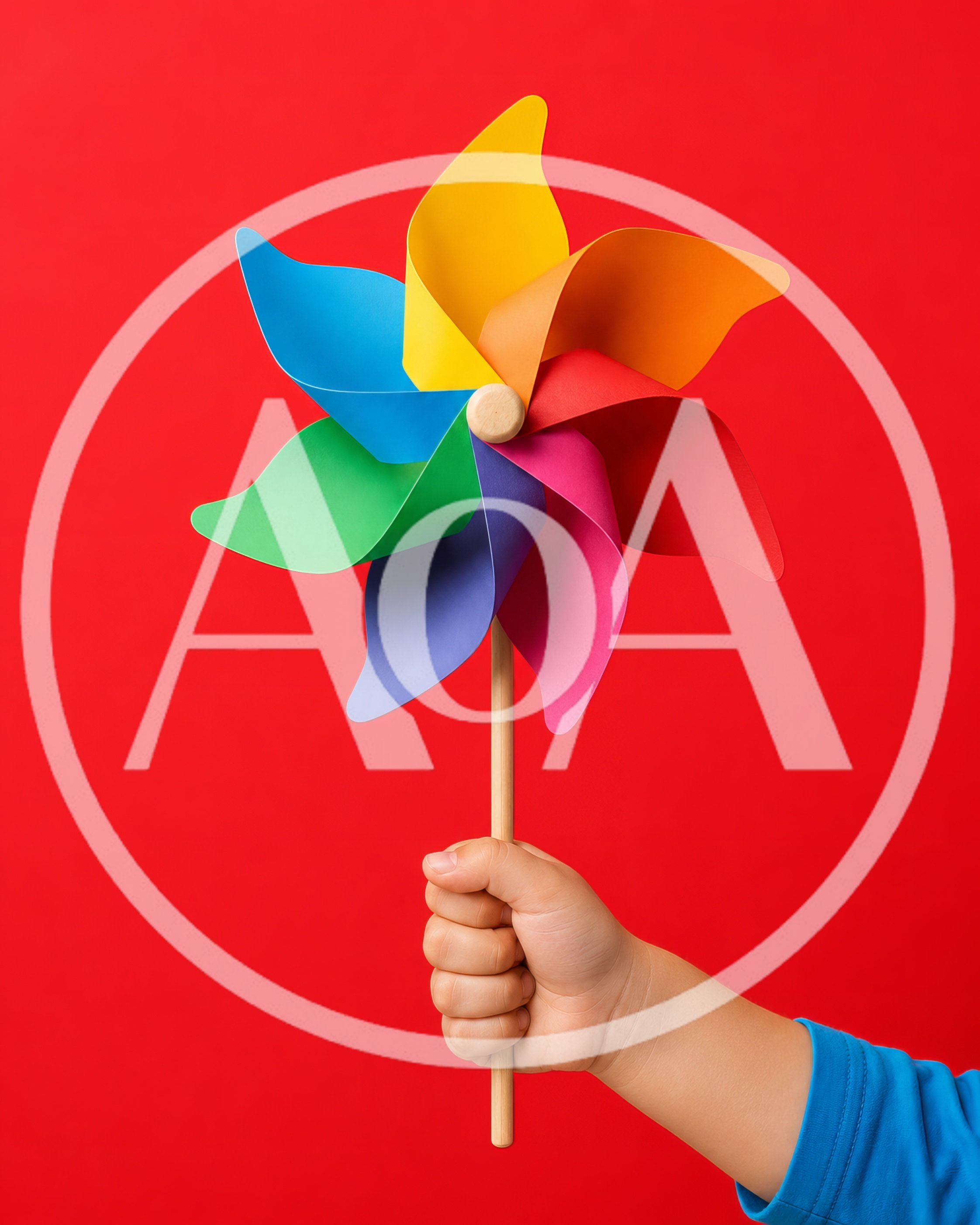 Child Holding A Colorful Pinwheel Toy
