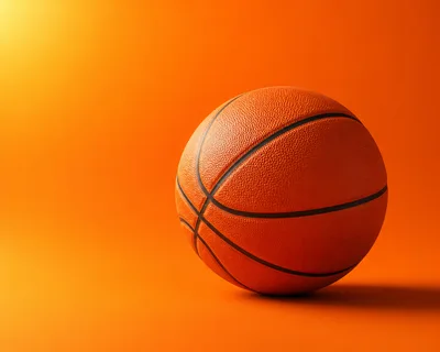 Professional Basketball Isolated On Vibrant Orange Background