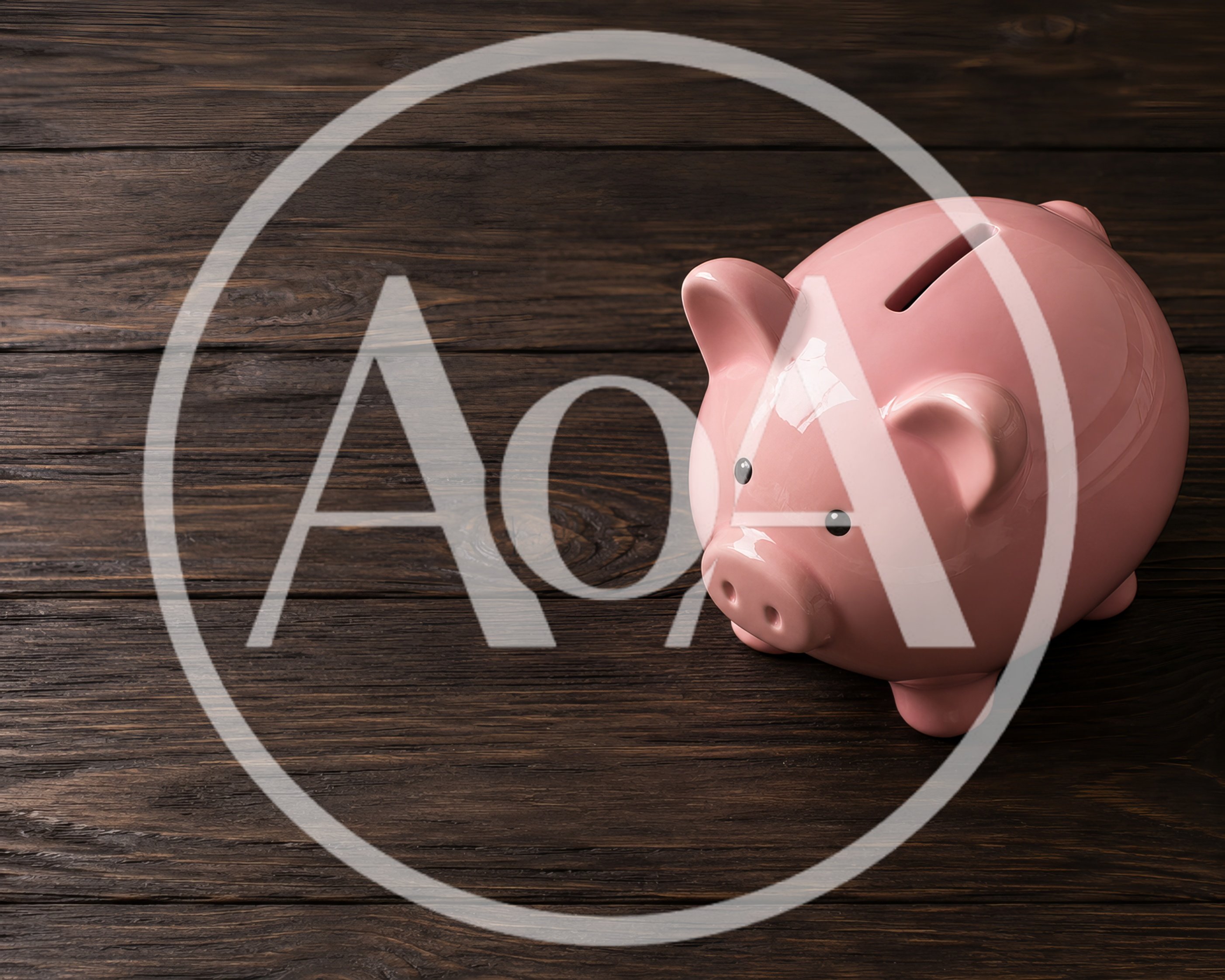 Pink Piggy Bank On Dark Wooden Surface