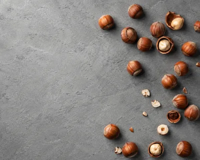 Top View Of Hazelnuts On Grey Stone Surface