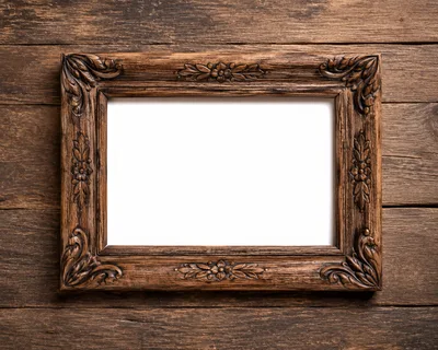 Ornate Wooden Picture Frame On Rustic Timber Background