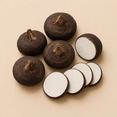 Fresh Water Chestnuts Whole And Sliced On Beige Background