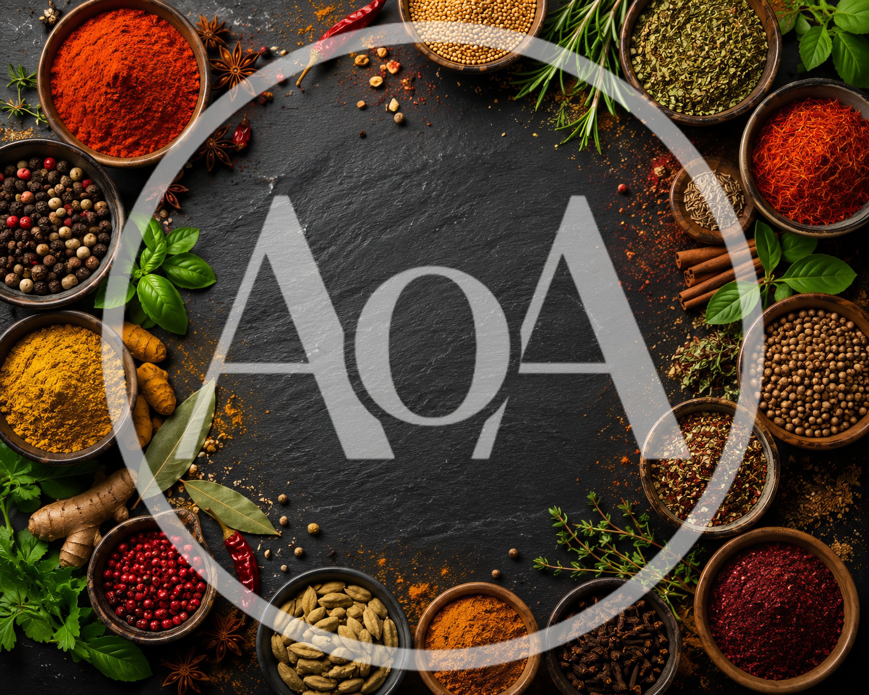 Assorted Spices and Herbs Arranged on Dark Stone