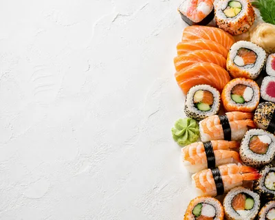 Assorted Sushi Platter On White Textured Background