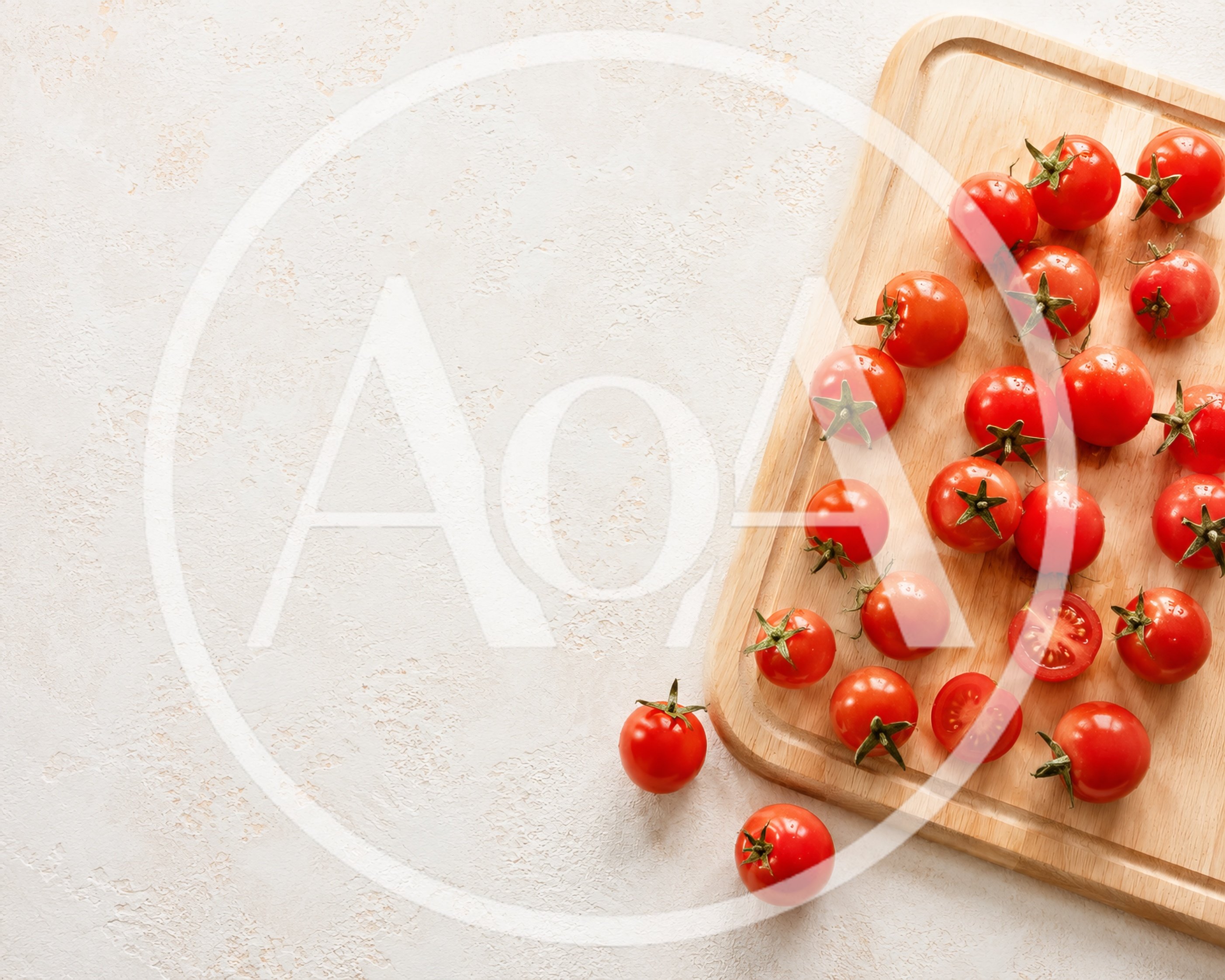 Fresh Cherry Tomatoes On A Wooden Cutting Board