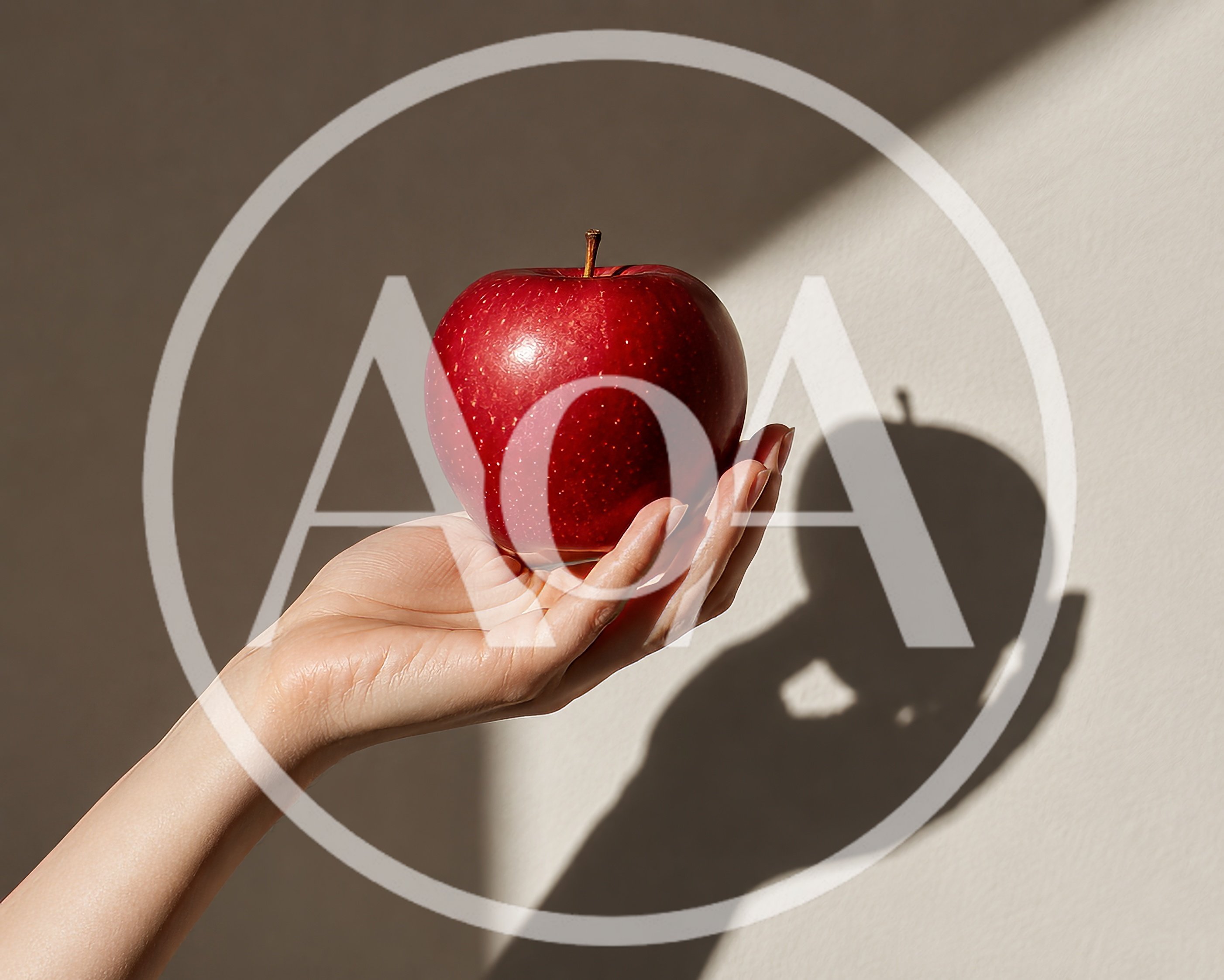 Hand Holding A Fresh Red Apple