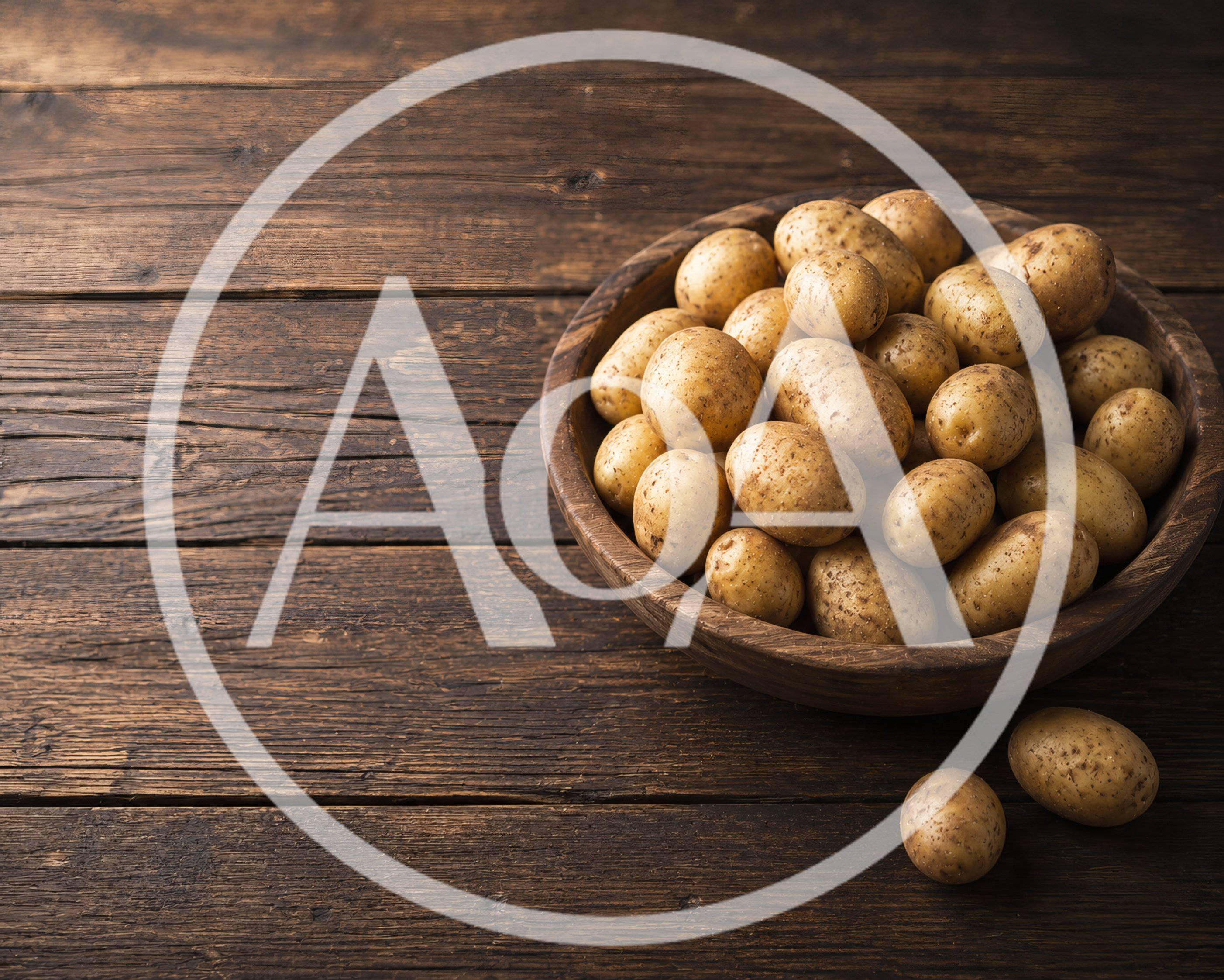 Fresh Raw Potatoes In A Wooden Bowl