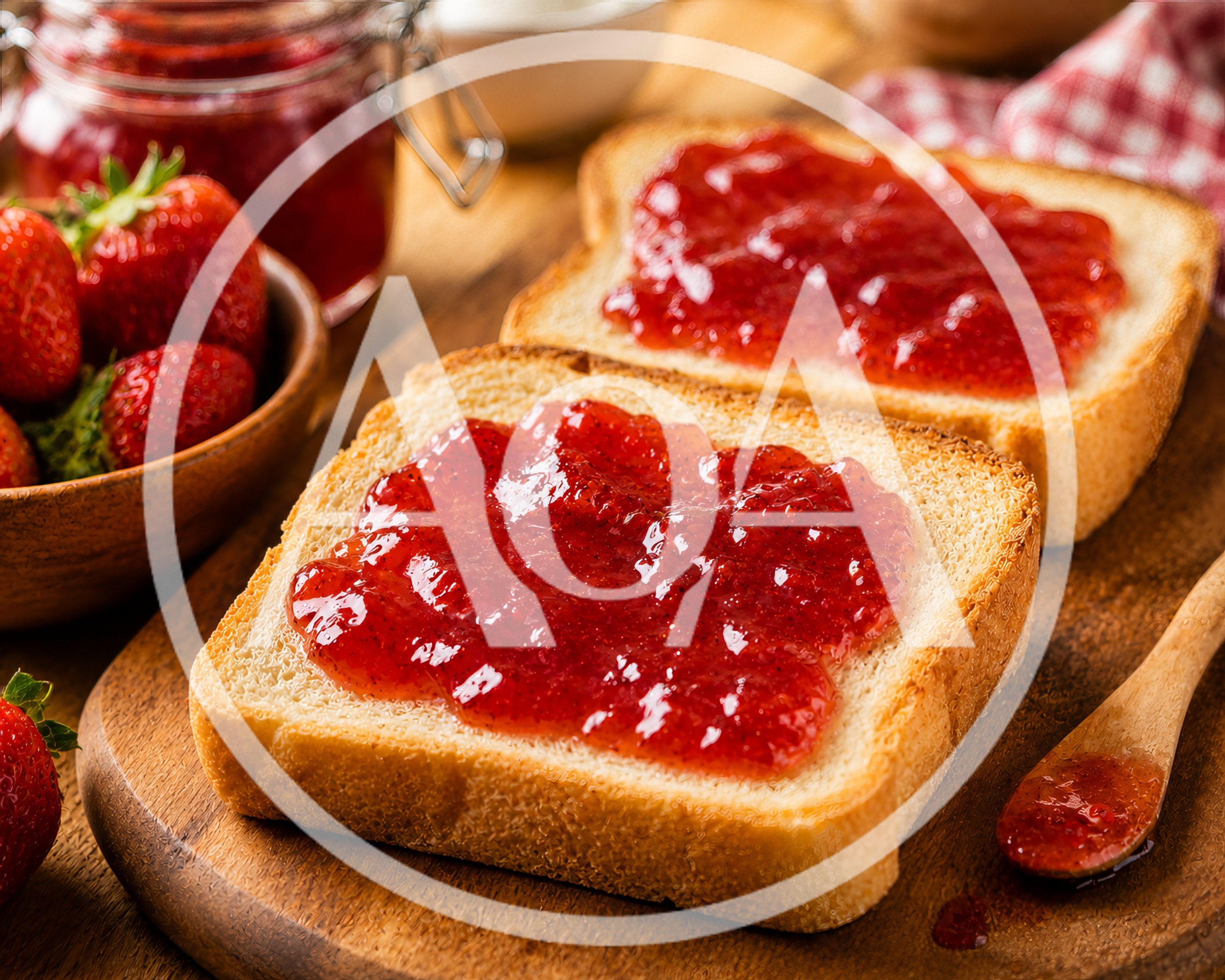 Two Slices Of Toast With Strawberry Jam