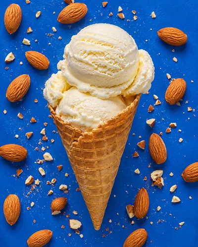 Vanilla Ice Cream Cone With Scattered Almonds