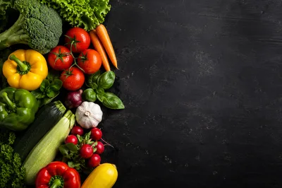 Fresh Assorted Vegetables Arranged On Black Background