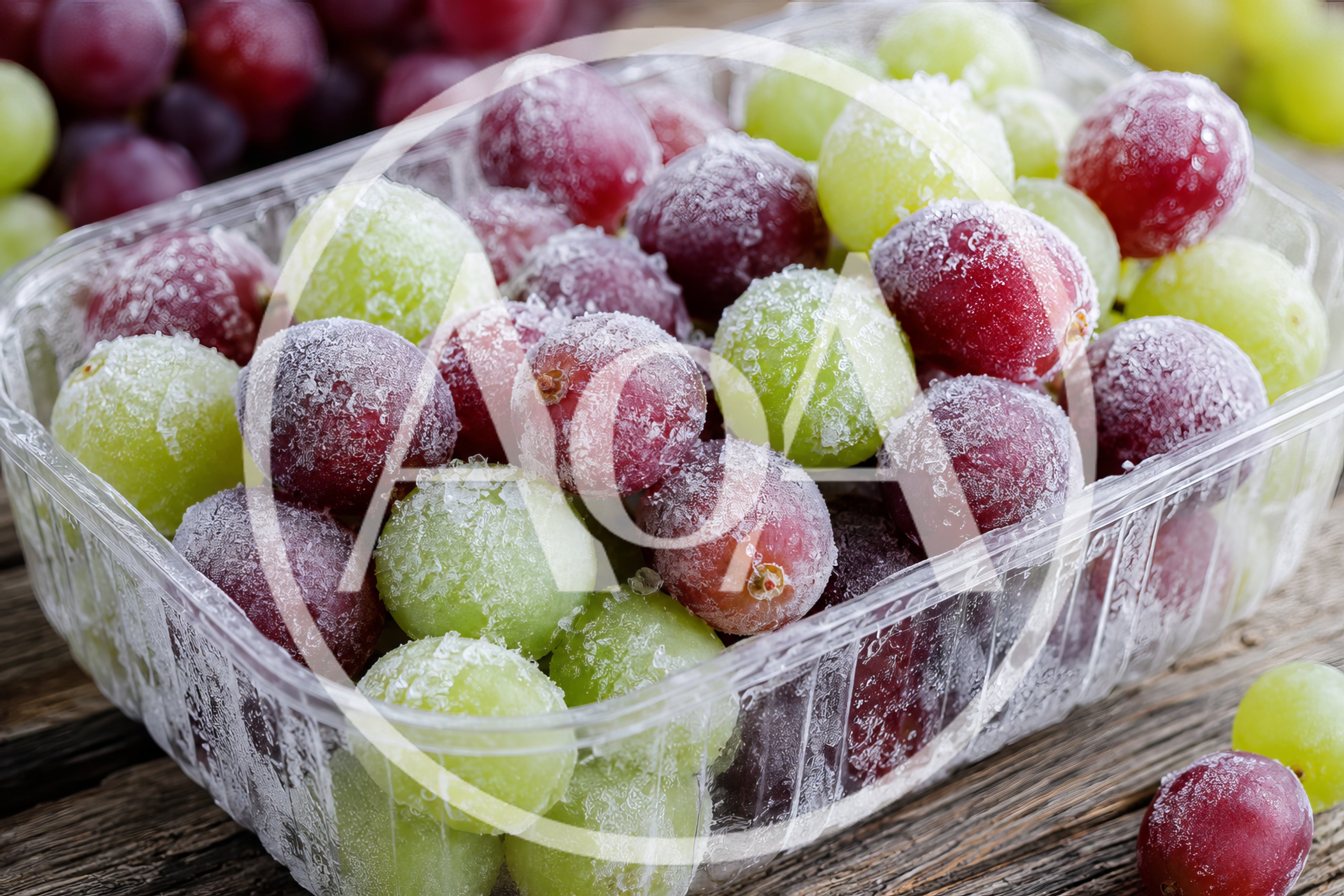 Frozen Red and Green Grapes in Plastic Container