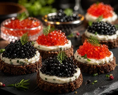 Gourmet Caviar Canapes On Dark Slate Platter