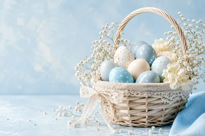 Easter Basket With Decorated Eggs And Flowers