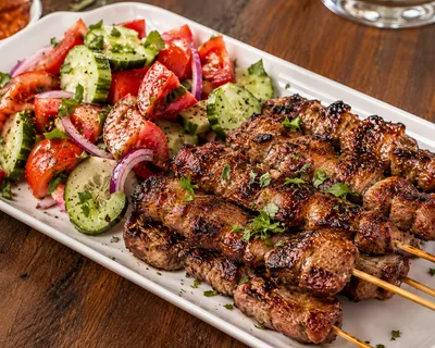 Grilled Meat Skewers With Fresh Vegetable Salad