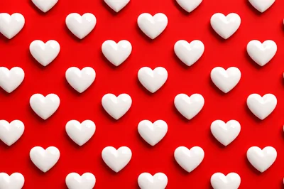 Pattern Of White Glossy Hearts On Red Background
