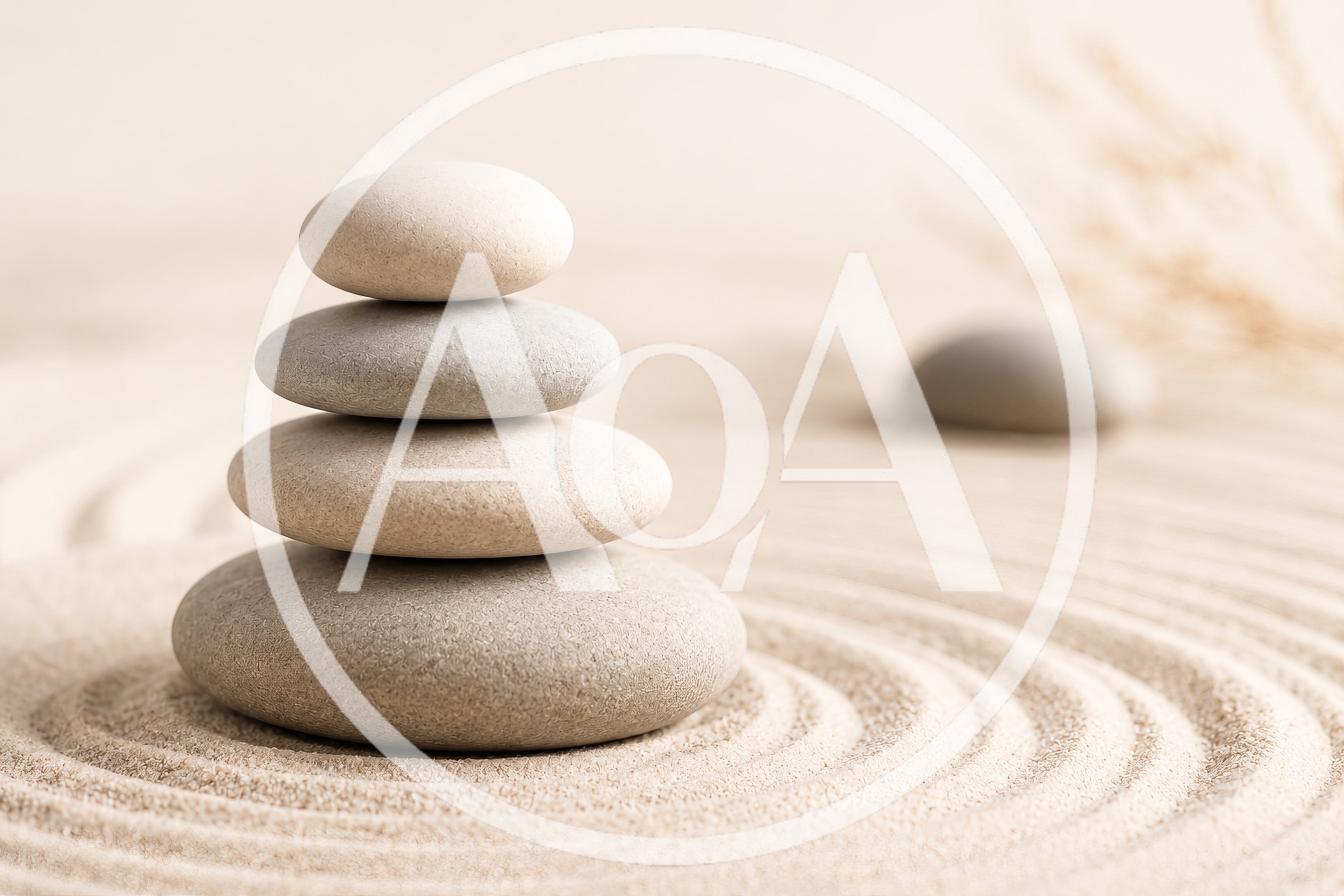 Stacked Zen Stones On Raked Sand