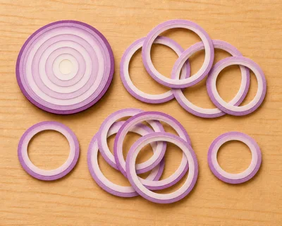 Sliced Red Onion Rings on Wooden Surface