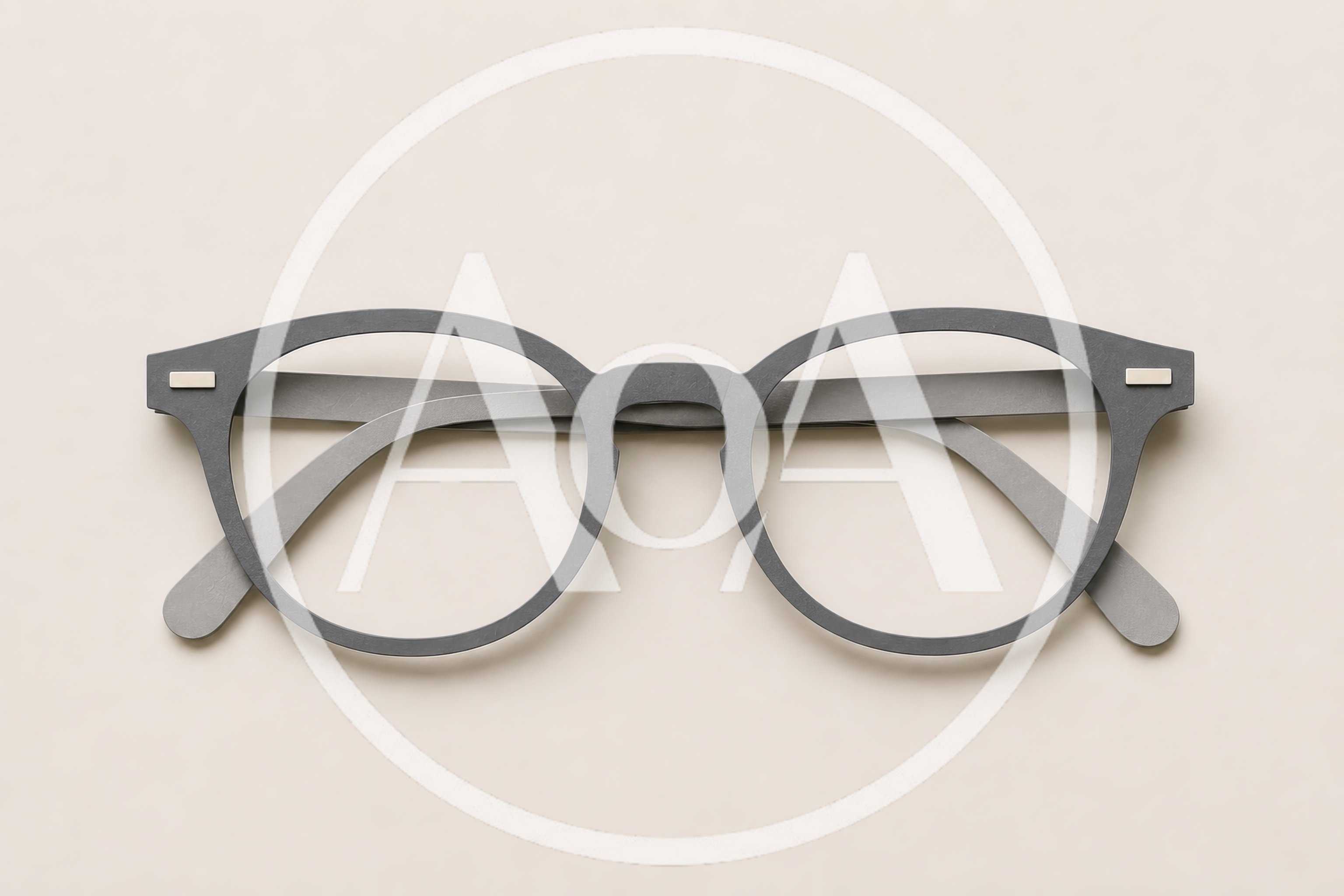 Minimalist Grey Eyeglasses On A Neutral Background