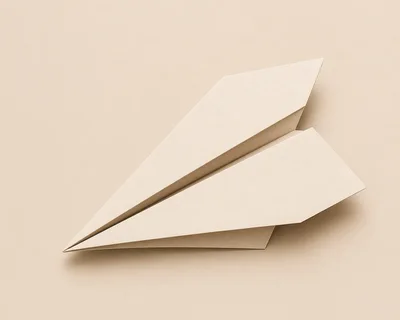 Minimalist Paper Airplane On A Beige Background