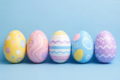 Five Colorful Decorated Easter Eggs In A Row