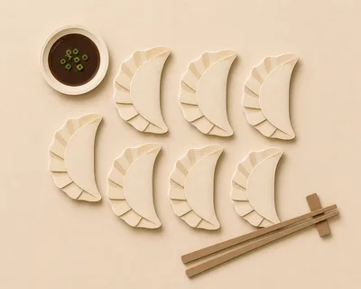 Top View Of Dumplings With Soy Sauce And Chopsticks