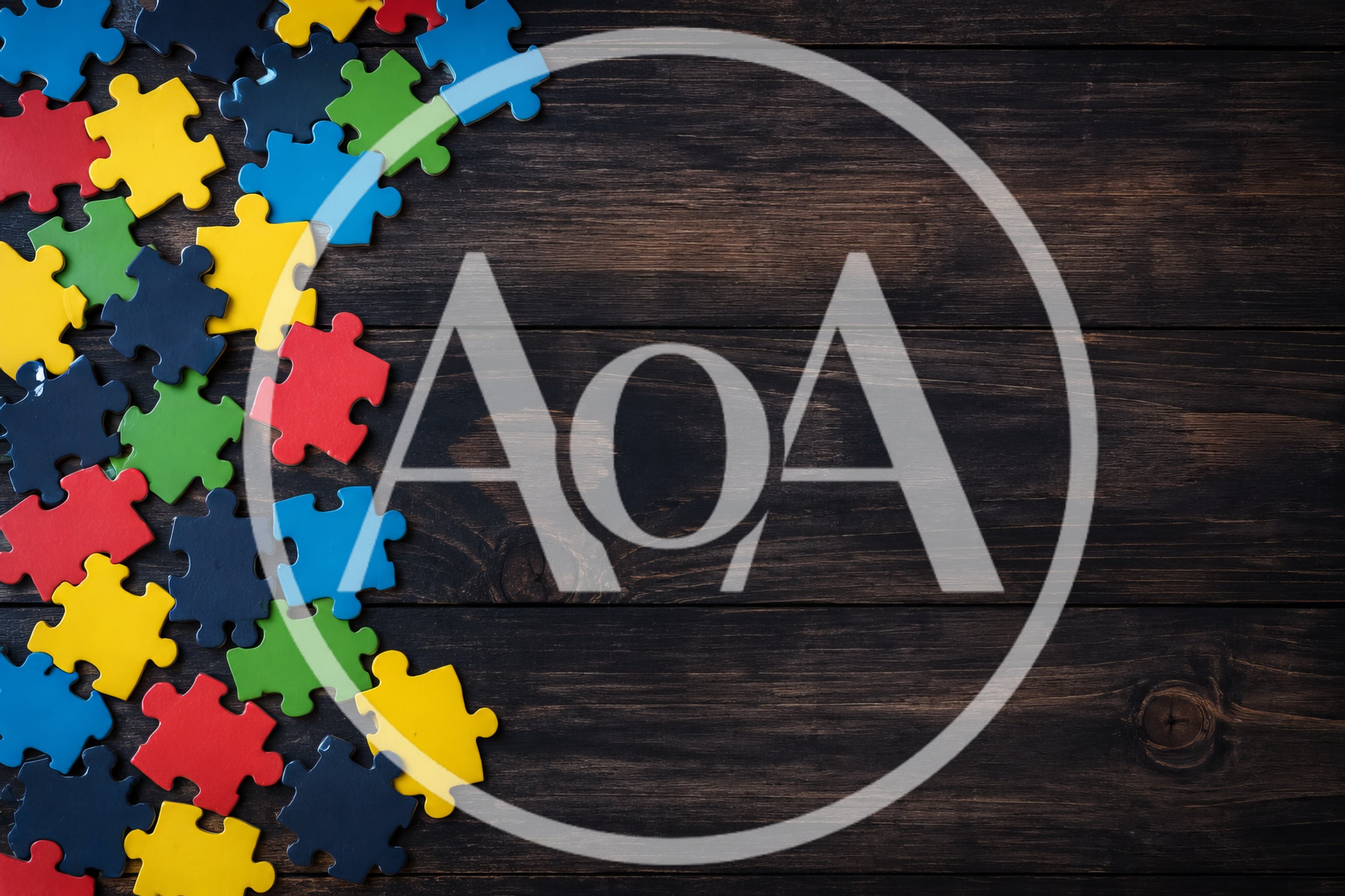 Colorful Jigsaw Puzzle Pieces on Dark Wooden Background