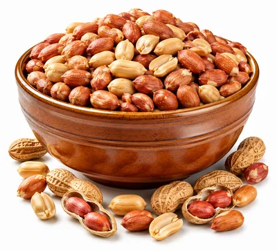 Bowl Of Roasted Peanuts With Scattered Nuts