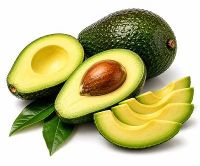 Fresh Whole And Sliced Avocados With Green Leaves