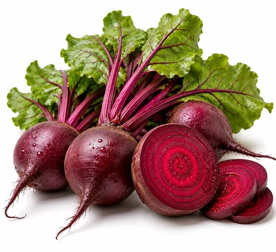 Fresh Whole And Sliced Red Beets With Green Leaves
