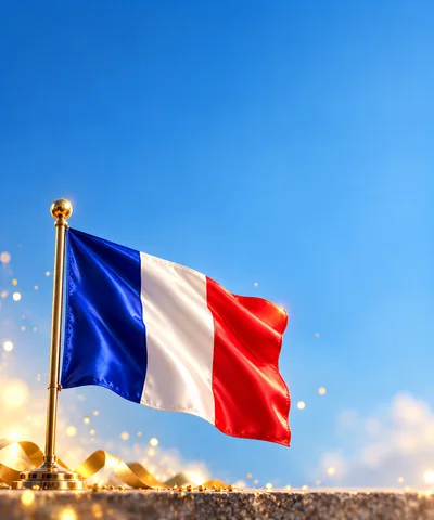 French Flag Waving Against A Clear Blue Sky