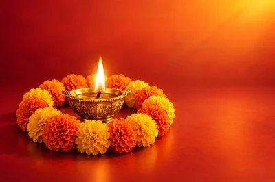Diwali Diya Lamp Surrounded By Marigold Flowers