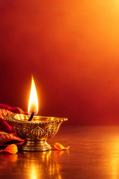 Golden Diya Lamp With Flame For Diwali Celebration