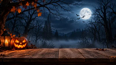 Halloween Jack O Lantern On Wooden Table At Night