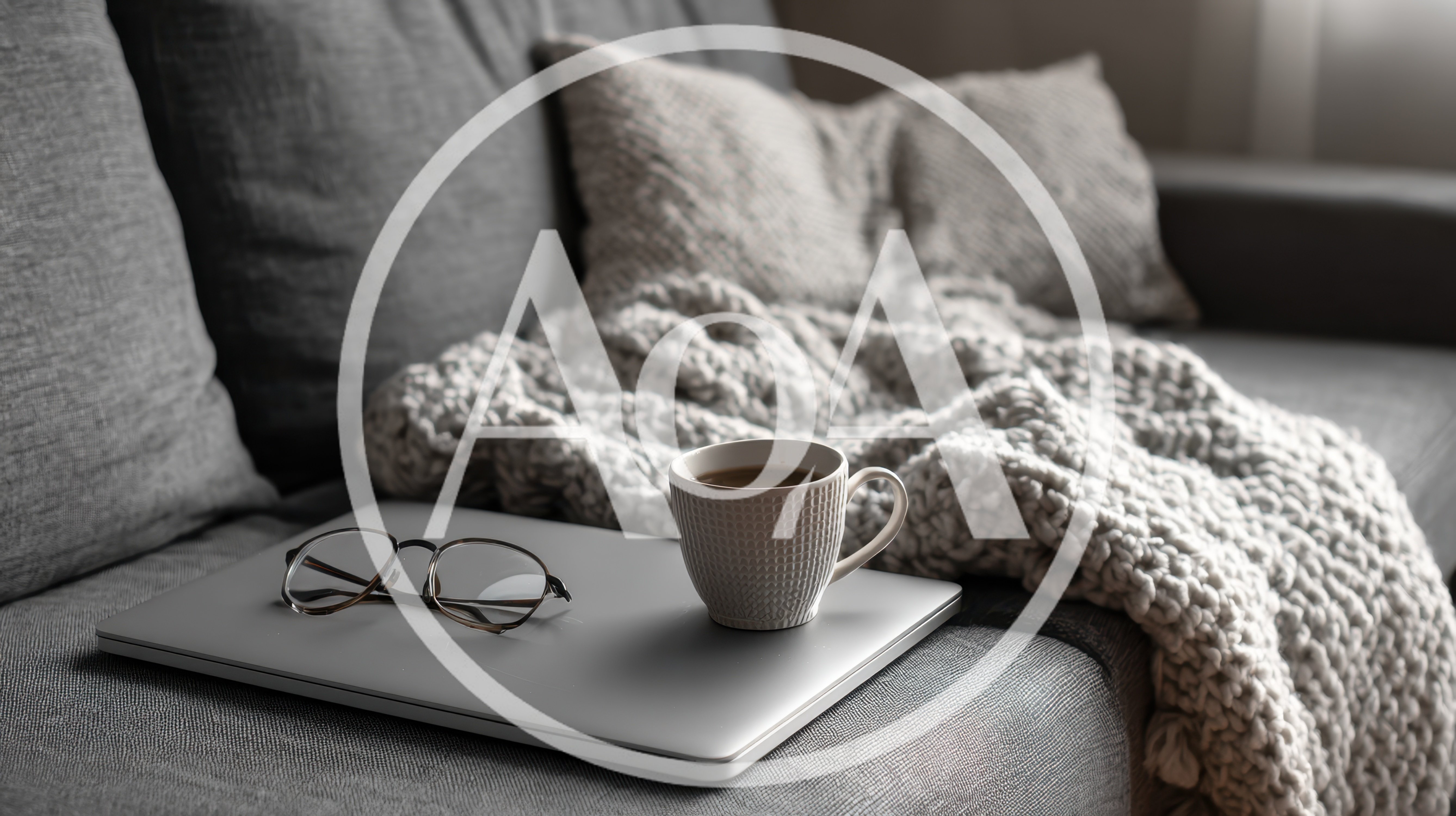 Cozy Workspace Setup With Laptop Coffee And Glasses