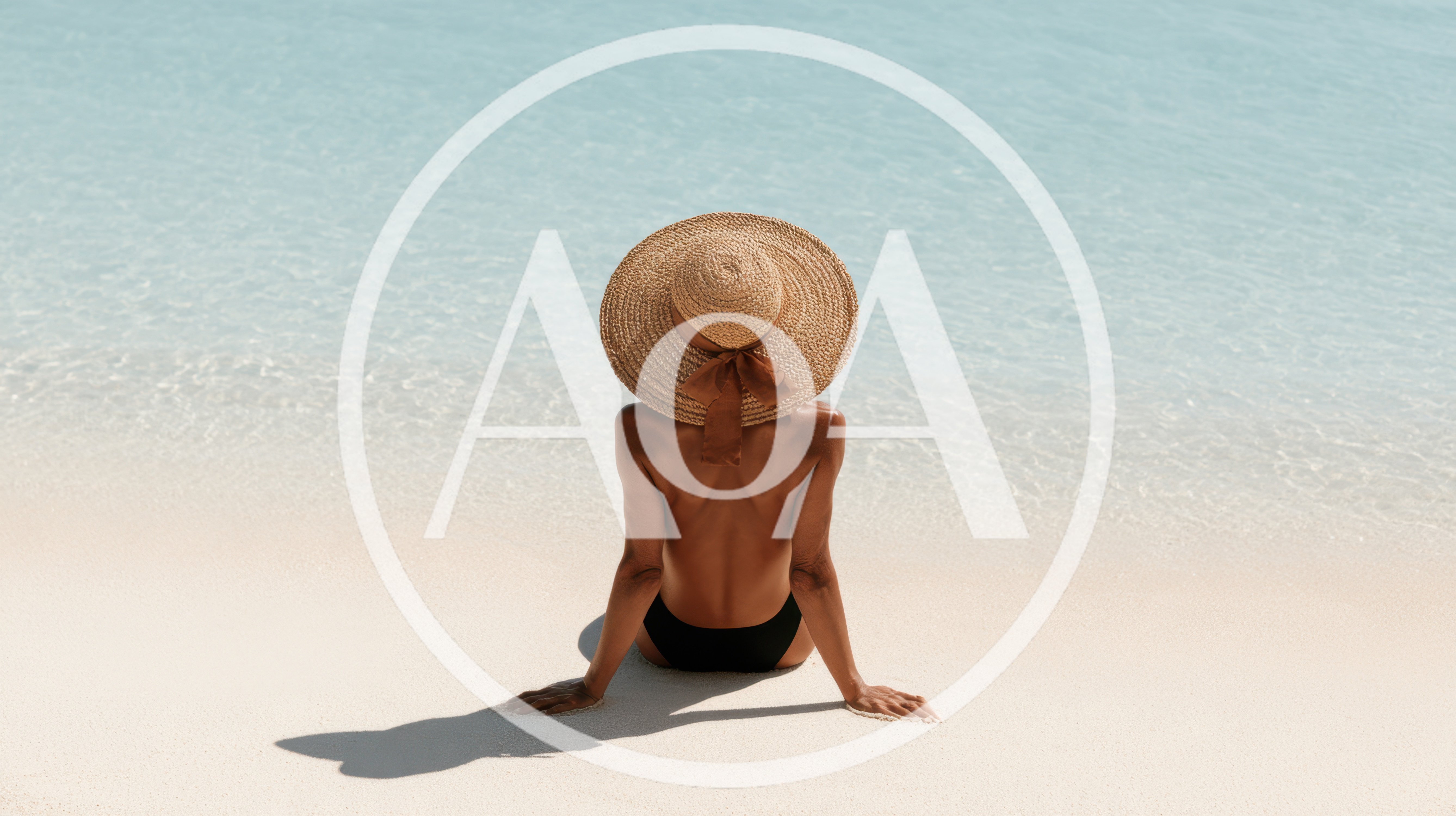 Woman Sitting On Tropical Beach Wearing Straw Hat