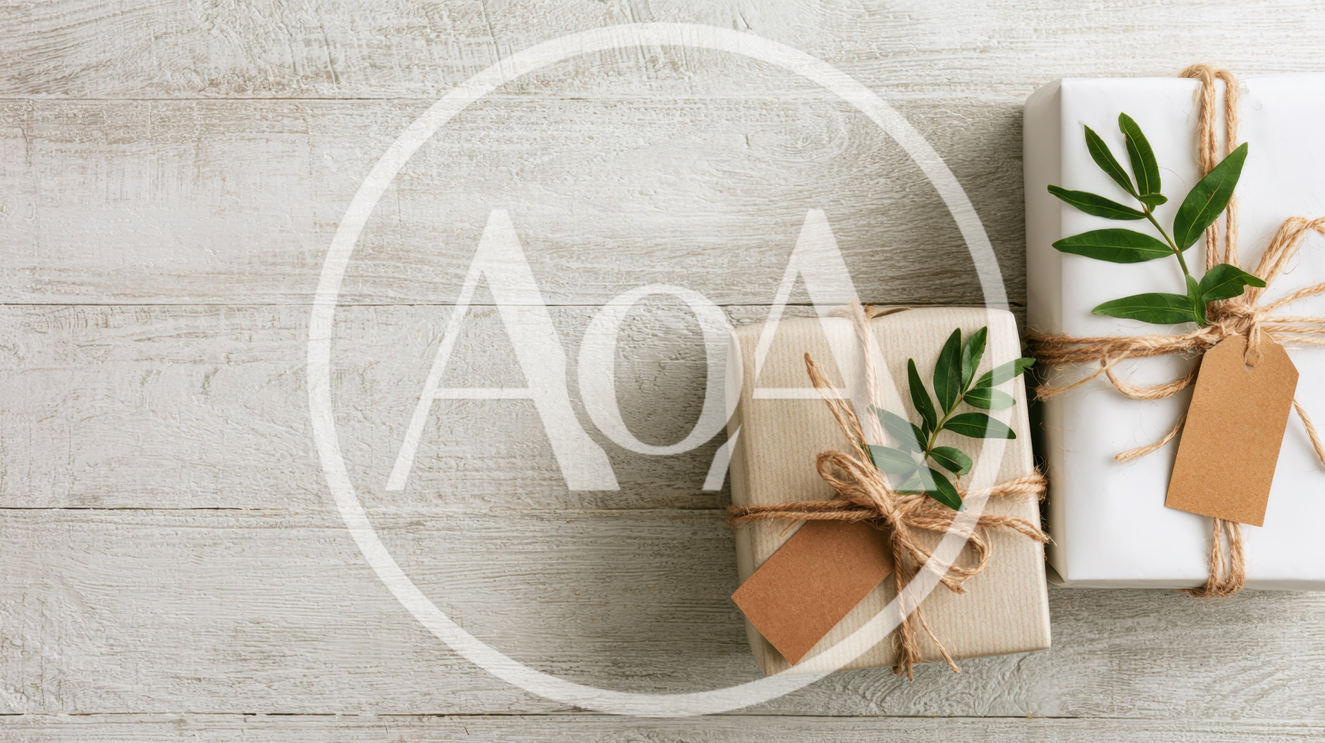 Two Wrapped Gift Boxes on Rustic Wooden Background