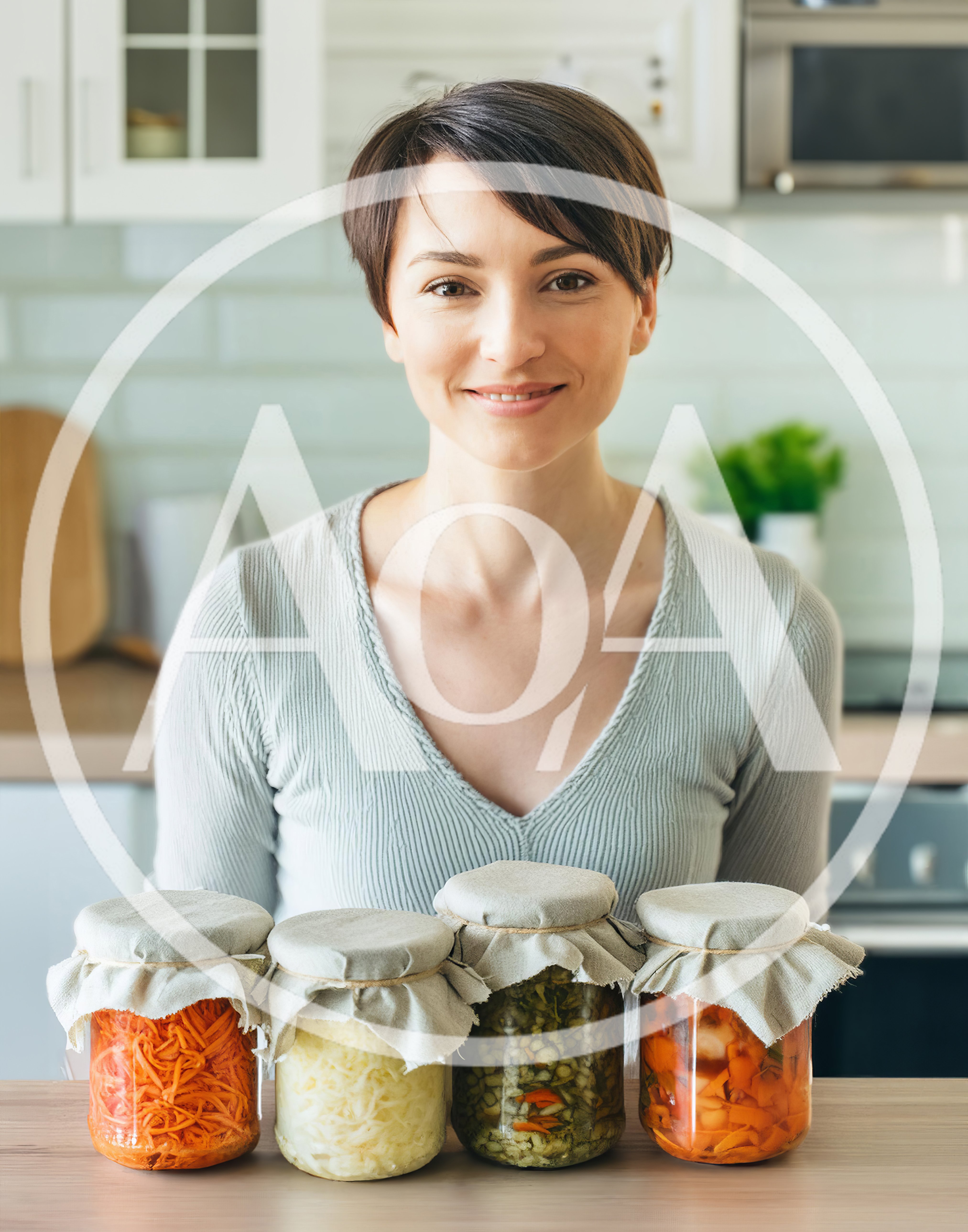 Woman Presenting Homemade Fermented Vegetables In Glass Jars