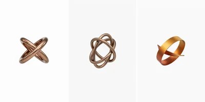 Three Abstract Metallic Geometric Sculptures On White Background
