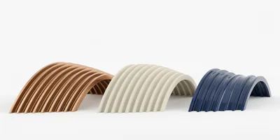 Three Curved Corrugated Metal Arch Structures