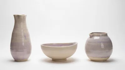Three Handmade Ceramic Vessels On White Background